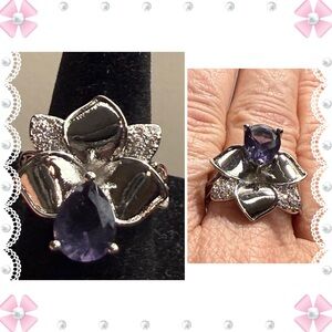 Ring - sz 7.5 - silver tone with large purple stone and small clear stones. New